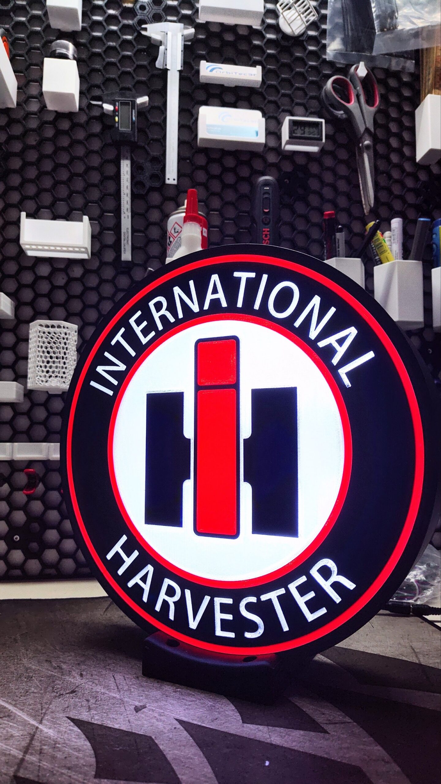 International Harvester skilt med lys
